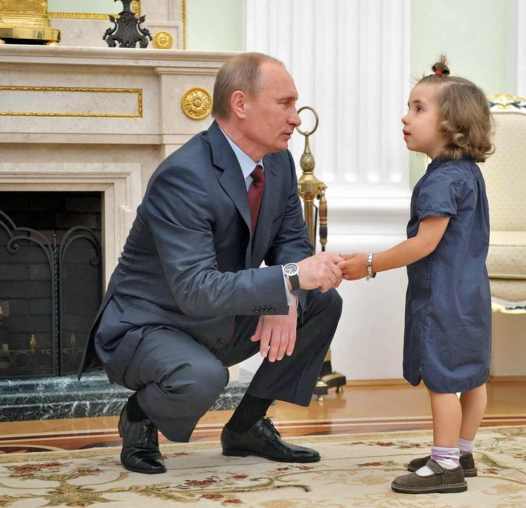 No, really. I have your best interests in mind: Putin with unconvinced child