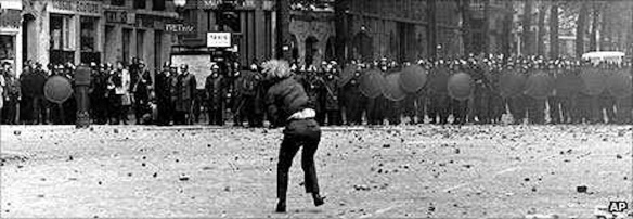 Student demonstrator confronting riot police, Paris, May 1968