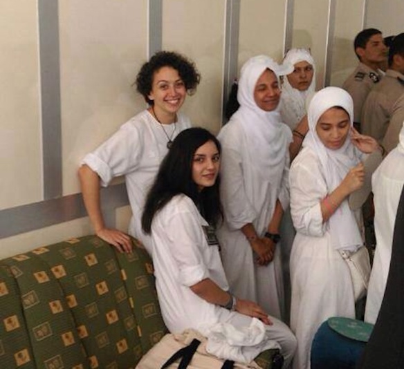 Yara Sallam (top L), Sanaa Seif (bottom L), and three other defendants in prison garb at a September 13 hearing 