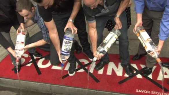 Politics is so draining: Bar-goers dump Stolichnaya at a West Hollywood protest, 2013. Photo from International Business Times