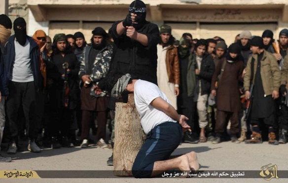 Man beheaded in Raqqa for blasphemy, December 2014. Photo from ISIS-affiliated social media